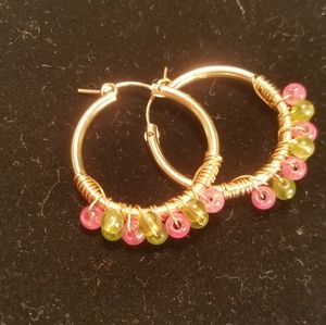 Womens stainless steel / gold earring